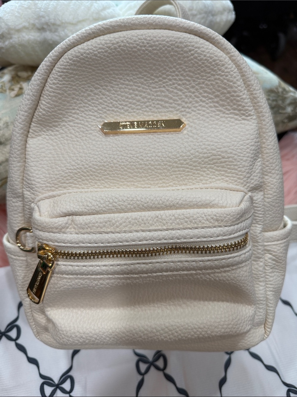 Steve Madden Cream Mini Backpack with Gold Accents